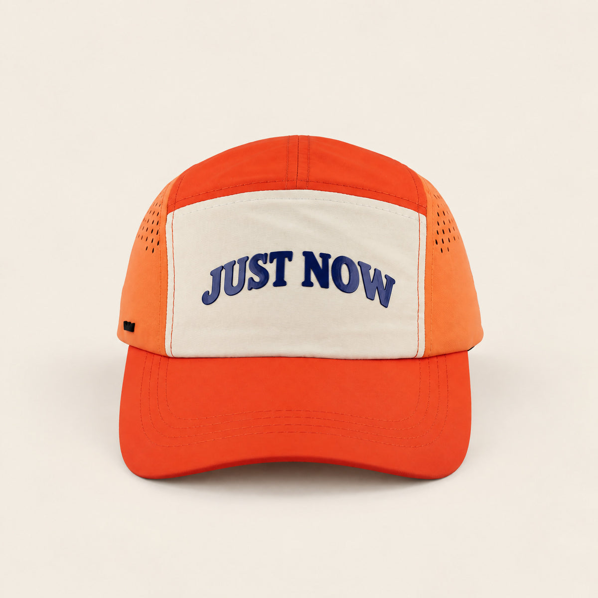 Just Now orange cap, front